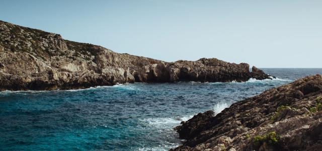 blue ocean by the rocks